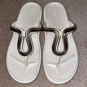 Crocs flip-flops, women’s size 8